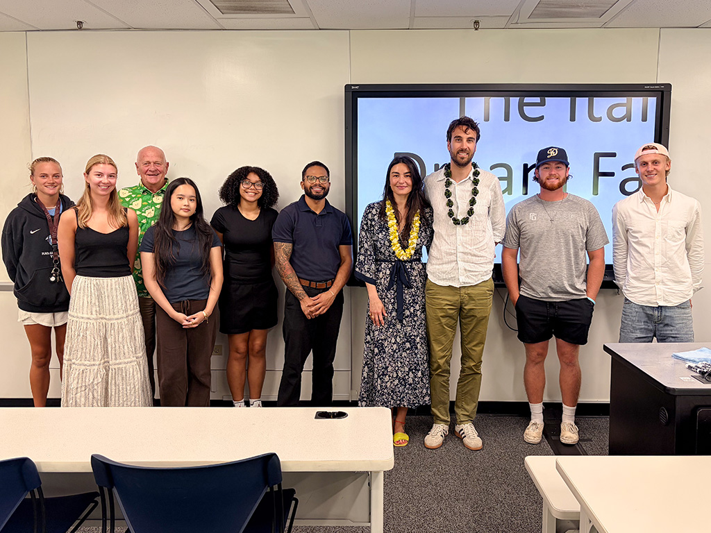 Luca Alessi (third from right) with his wife Juliana Ogliari (fourth from right) with HPU marketing students