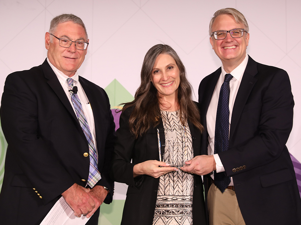 Jana Cason (center) with Charles Doarn (left) and ATA CEO Kyle Zebley (right)