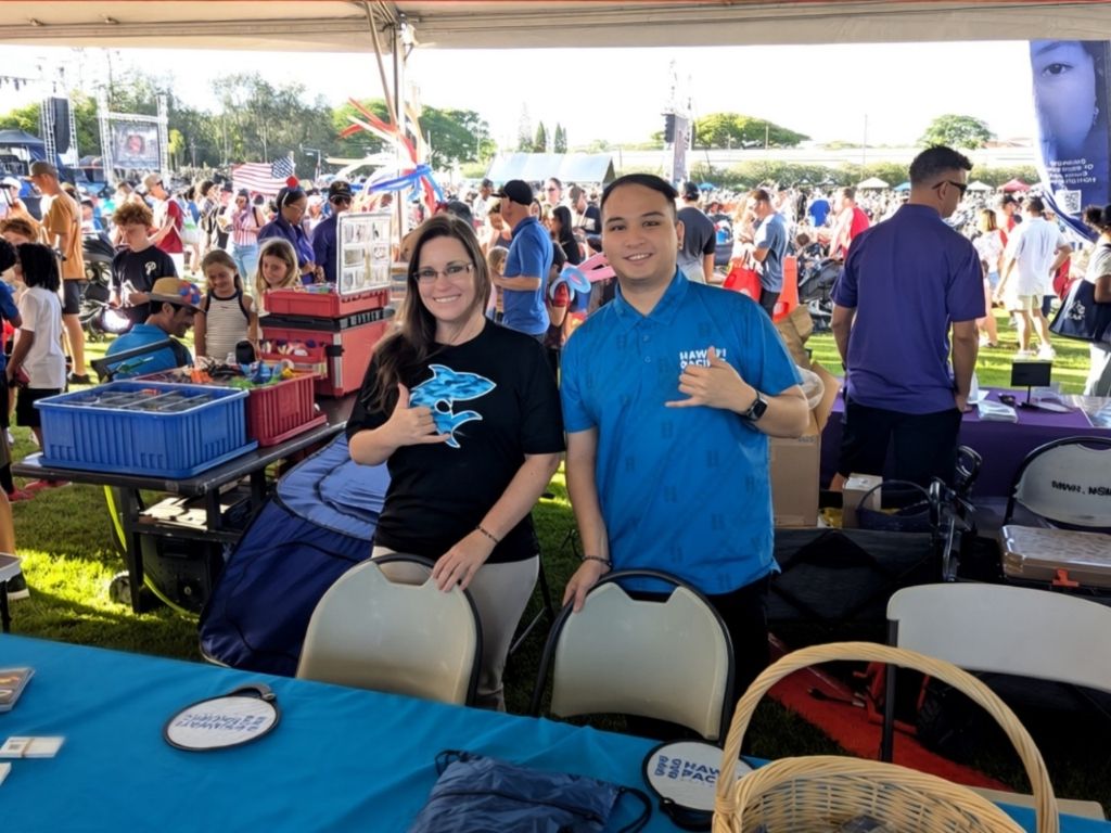 Assistant Directors of Admissions for Military Campus Programs Rachel Jones and Jo Roberto at the Independence Day Celebration at Schofield Barracks