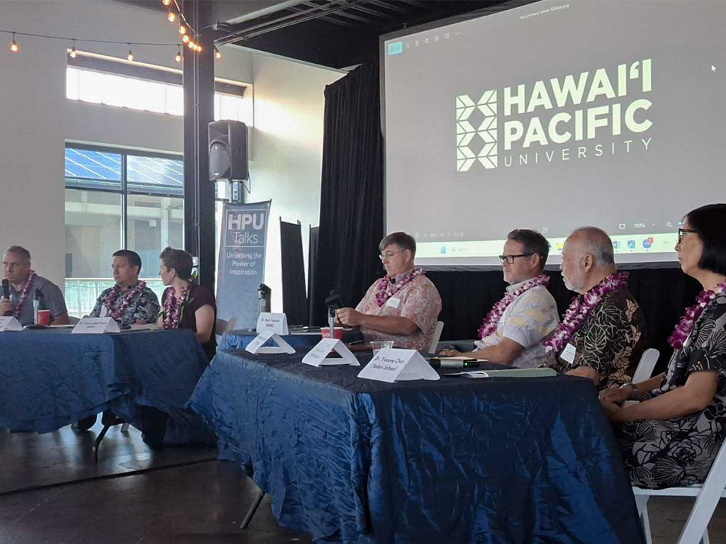 A group panel discussion during the symposium