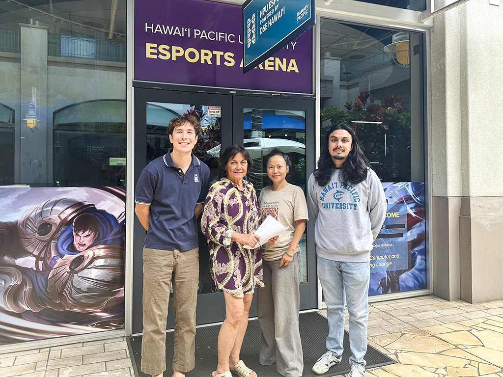 Ready for showtime: (left to right) HPR producer Kevin Allen, 'The Conversation' host Catherine Cruz, HPR producer Lillian Tsang, and Kevin Rebello outside the HPU Esports Arena at Aloha Tower Marketplace before the live broadcast