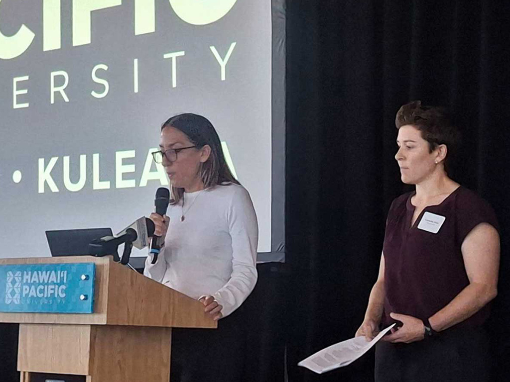(Left to right) Oliva Nigro and Carmella Vizza speaking to the press before the symposium began