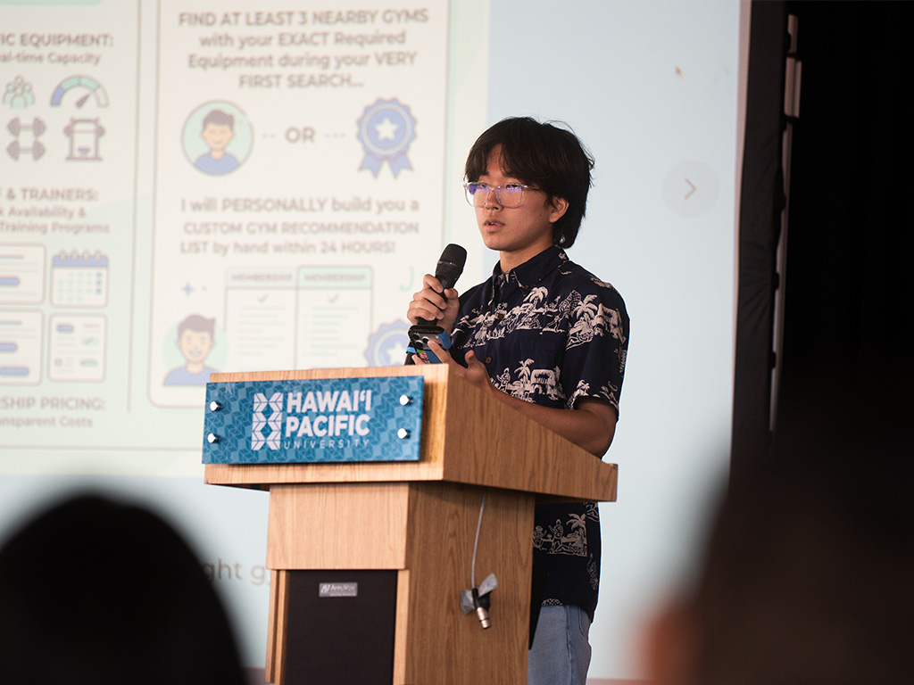 A Hawai'i high school student presenting his venture on presentation day