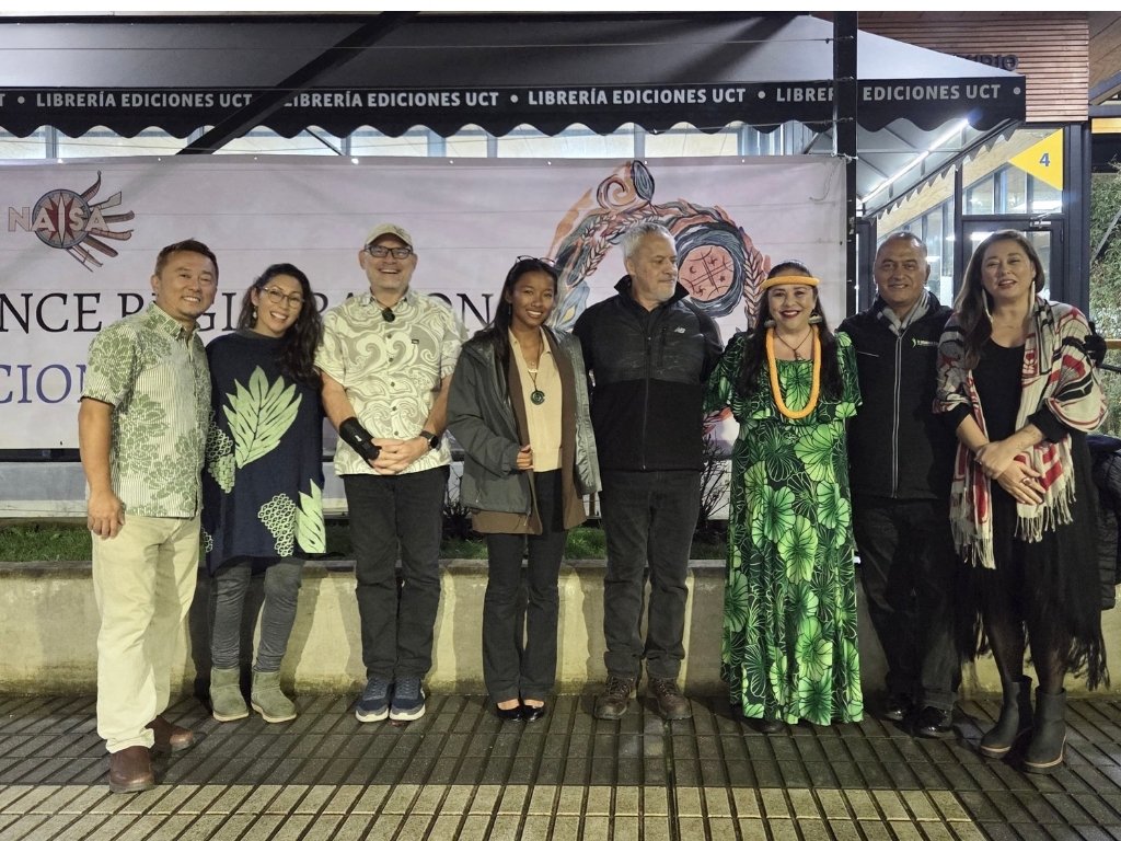 At the NAISA Conference Site at the Catholic University of Temuco, left to right, Vince Okada, Ph.D., Renee Rivera, Serge Marek, Ph.D., Annalysa Dumlao, Pete Britos, Ph.D., Tammy Martin, Ph.D, Peter Mataira, Ph.D., and Tracy Stewart, Ph.D