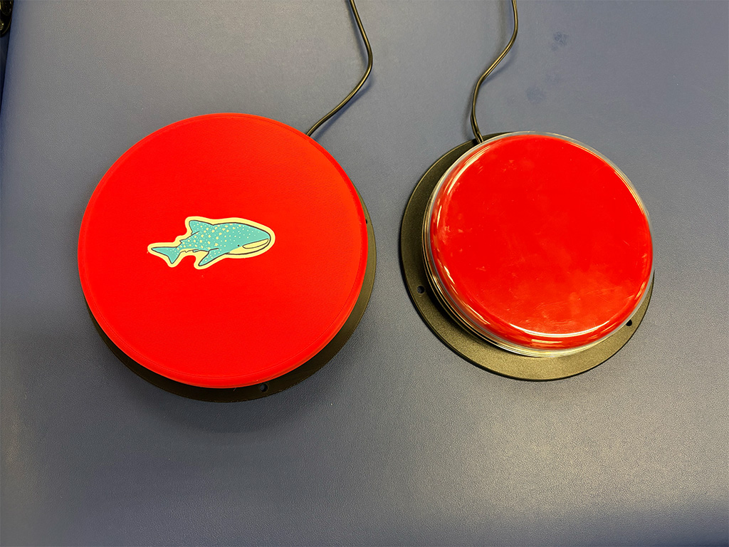 The new 3D-printed activation switch (left), designed by HPU engineering students, next to the commercially purchased switch used the previous year
