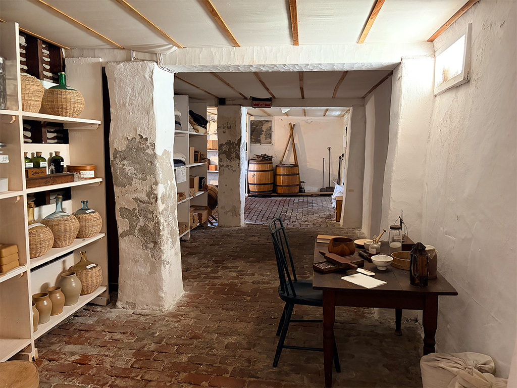 Beneath the oldest wood-frame house in Hawaiʻi, a cool brick cellar holds the barrels, bottles and tools of mission life