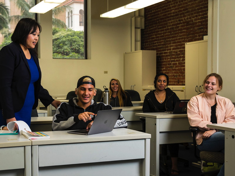 Dr, Phan working with her students
