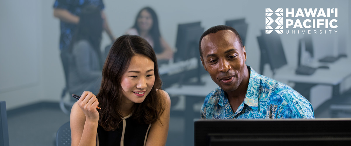 man and woman taking a graduate business class