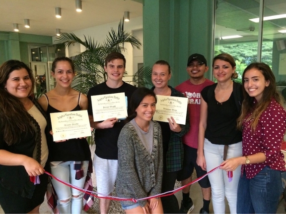 Students with their Alpha Epsilon Delta certificates at the Hawaii Loa Campus.