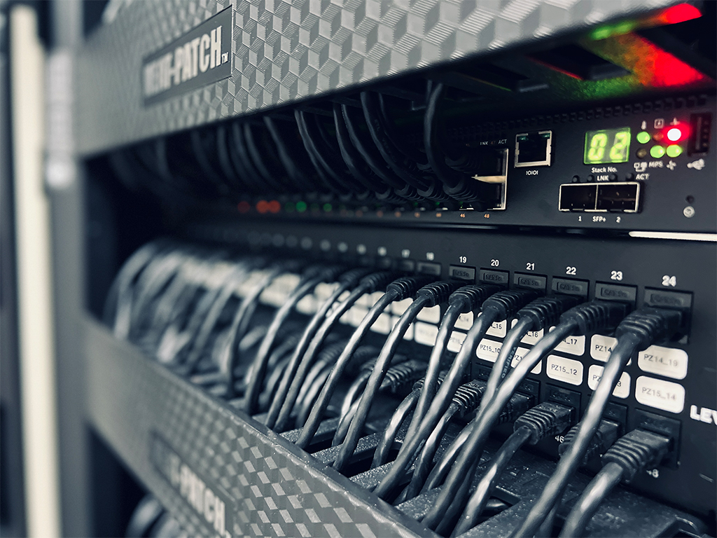 Patch panel underneath a network switch