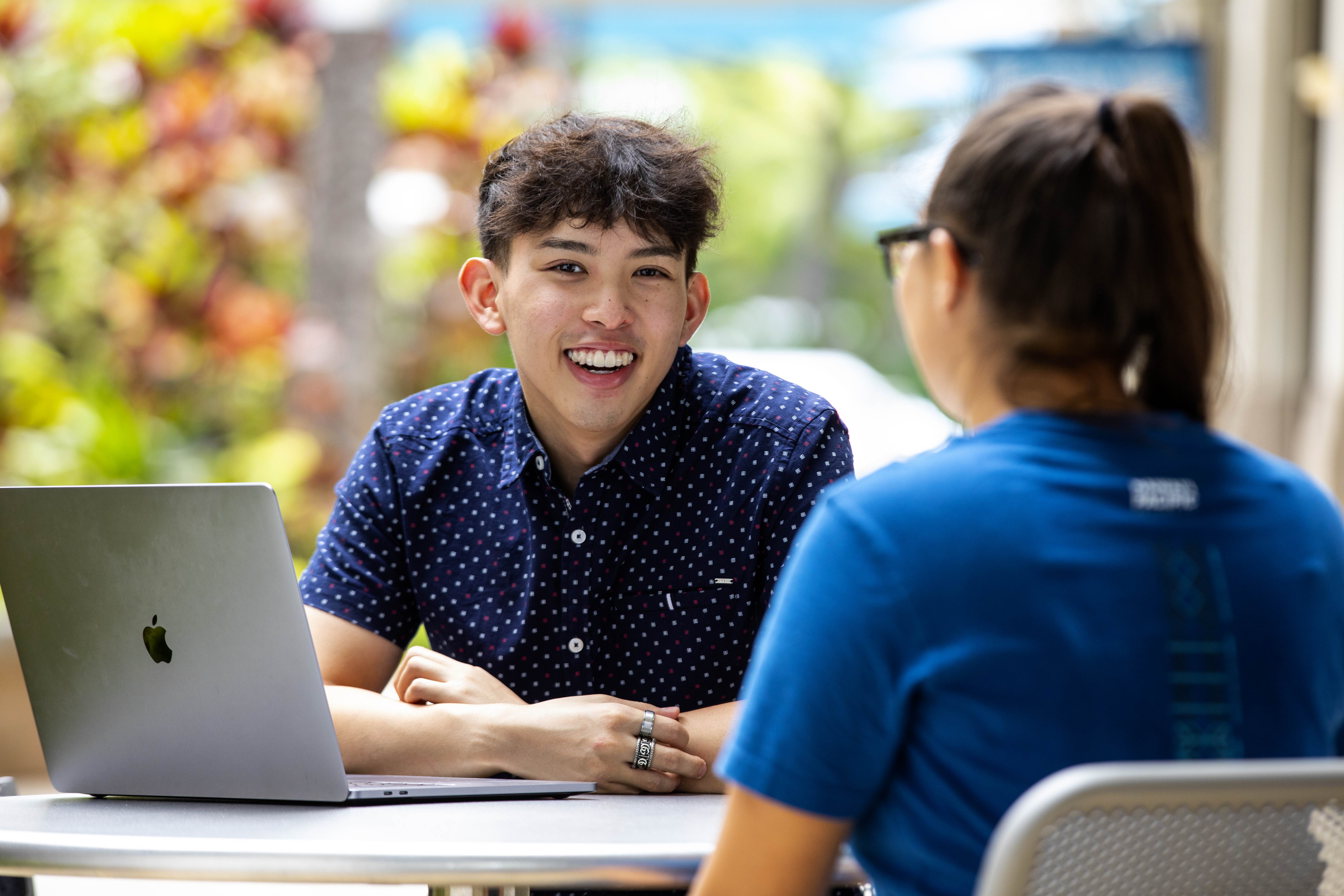 student working on laptop